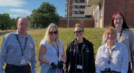 The Neighbourhood team and Fire Safety team at the Community Impact Day.png