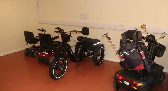 A mobility scooter store charging station.png