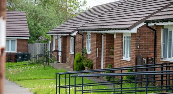 Front entrance to different bungalows on a street.png