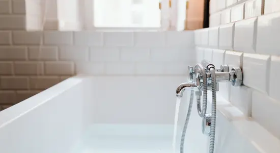 Water that is coming out of a tap for a bath.png
