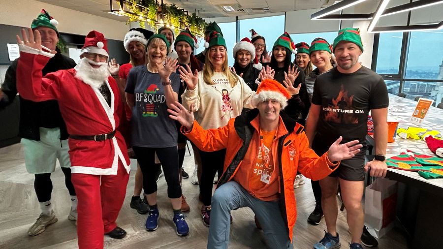 Colleagues Standing Together Elf Run